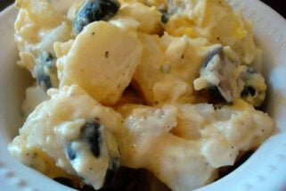 white bowl filled with creamy potato salad