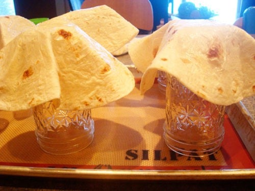Tortillas on Jar Not Baked tortillas draped on top of mason jars