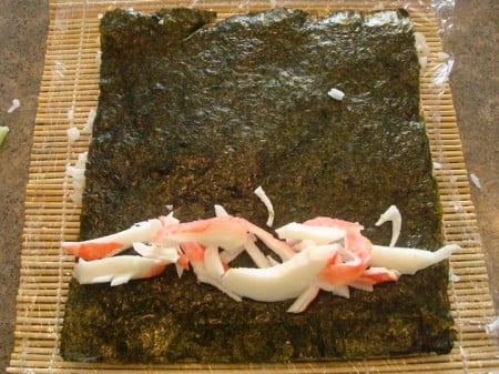 Rice Outside Layer3 crab meat on a sheet of nori
