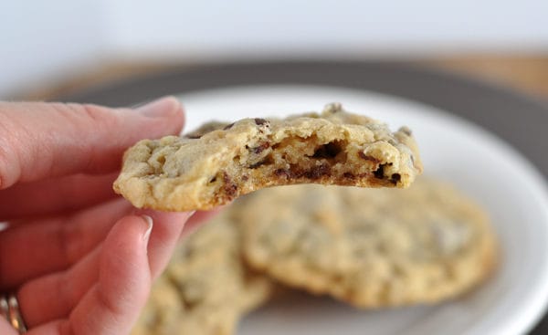 Side view of a chocolate with a bite taken out of it.