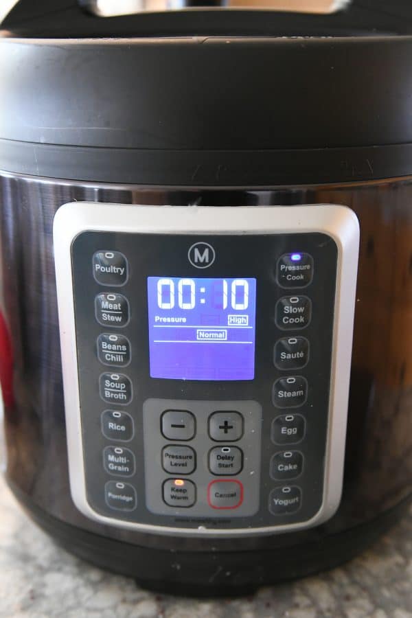 Mealthy pressure cooker set to 10 minutes cook time.