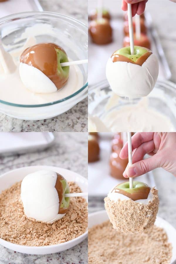 Dipping homemade caramel apples in white chocolate and graham cracker crumbs.