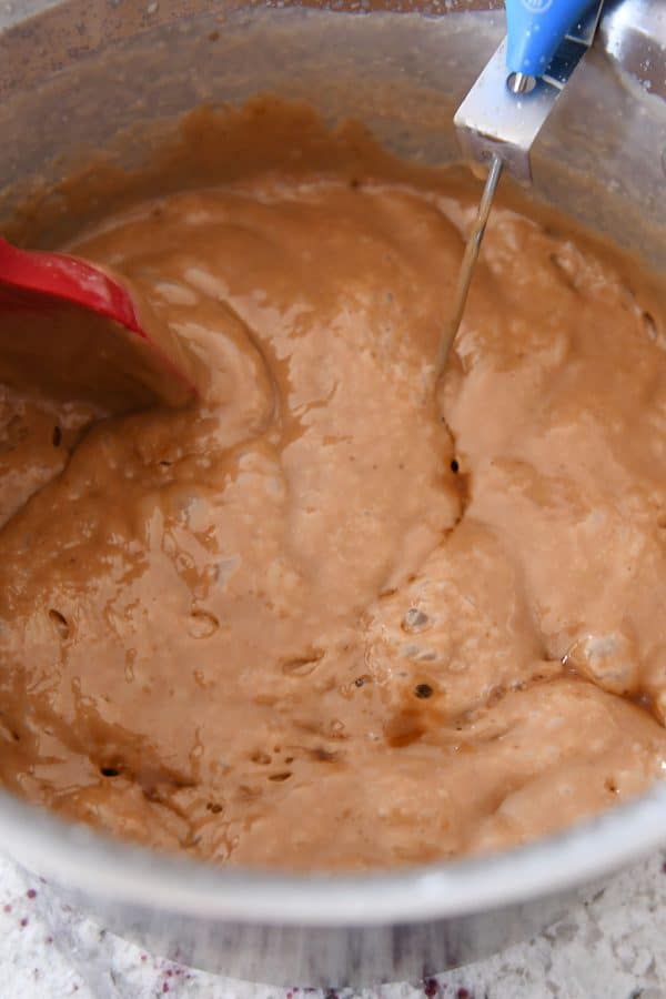 Stirring in vanilla to homemade caramels.