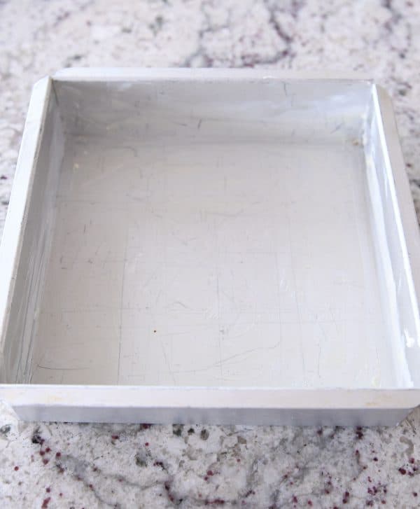 8X8-inch square pan buttered for caramels.