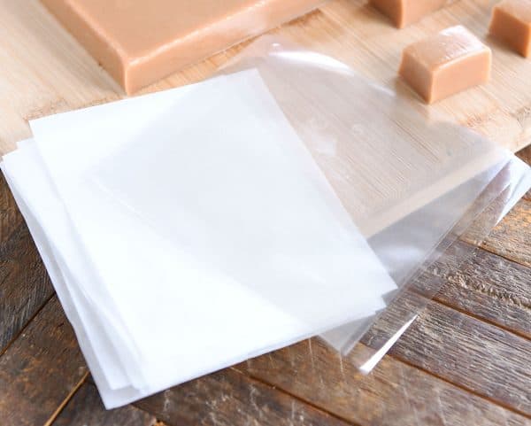 Cutting and wrapping homemade caramels.