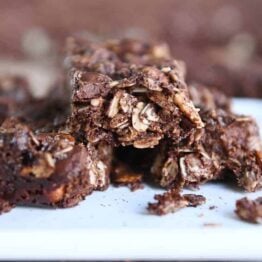 close view of broken dark chocolate brownie granola bar
