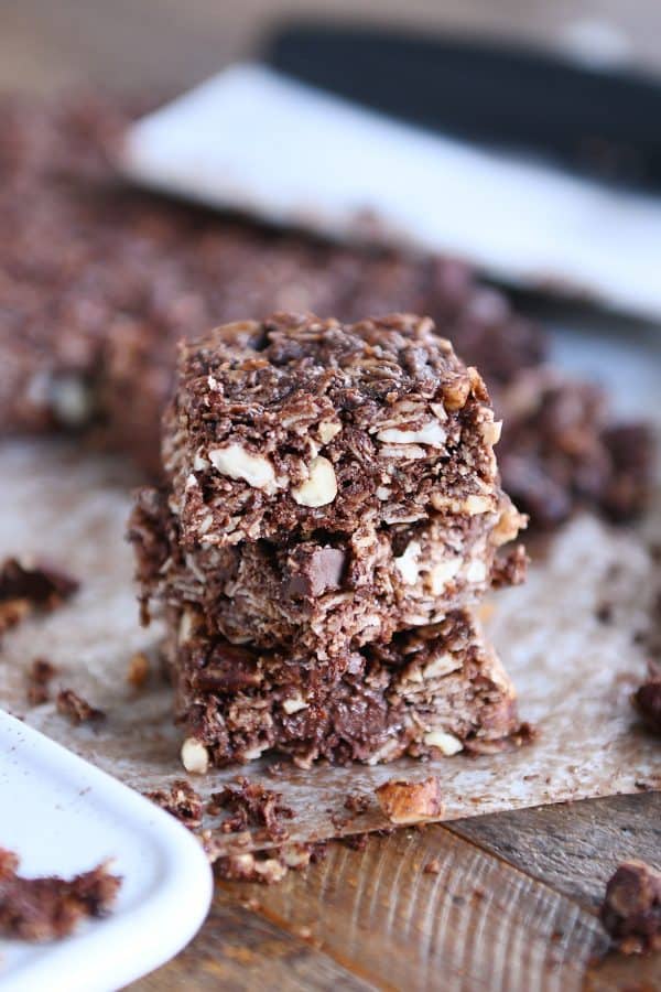 Dark chocolate brownie granola bars cut into squares.