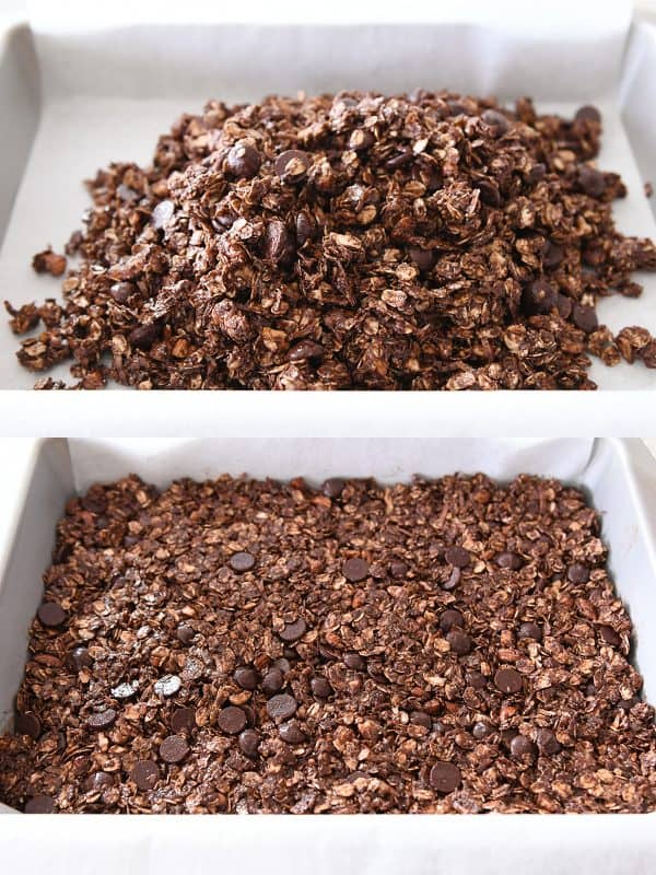 Pressing dark chocolate brownie granola bars into 9X13-inch pan.