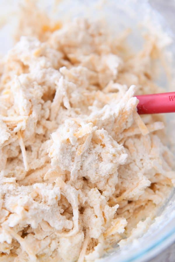 Mixing dough for the best cheesy garlic drop biscuits.