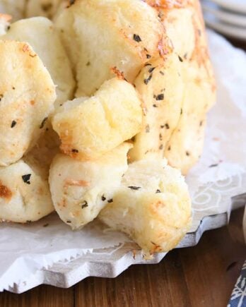 buttery garlic + herb pull-apart bubble bread with pieces on the side