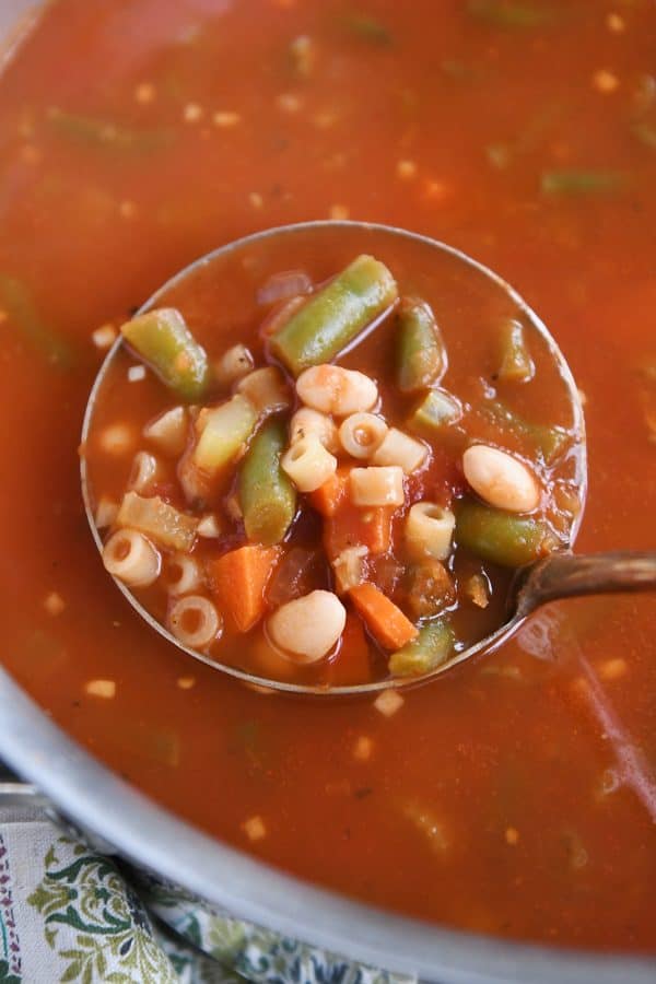 Ladle of minestrone soup.