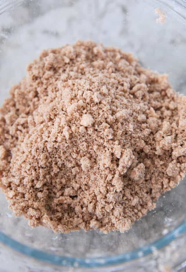 Cinnamon streusel in glass bowl.