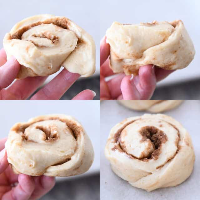 Tucking end of cinnamon roll underneath.