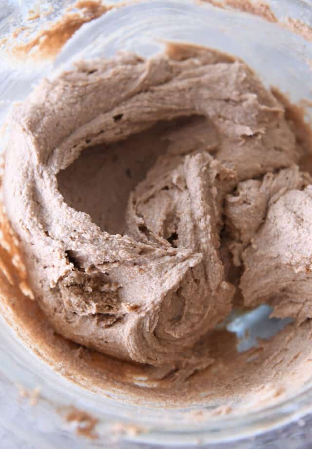 Cinnamon, butter and sugar in glass bowl.