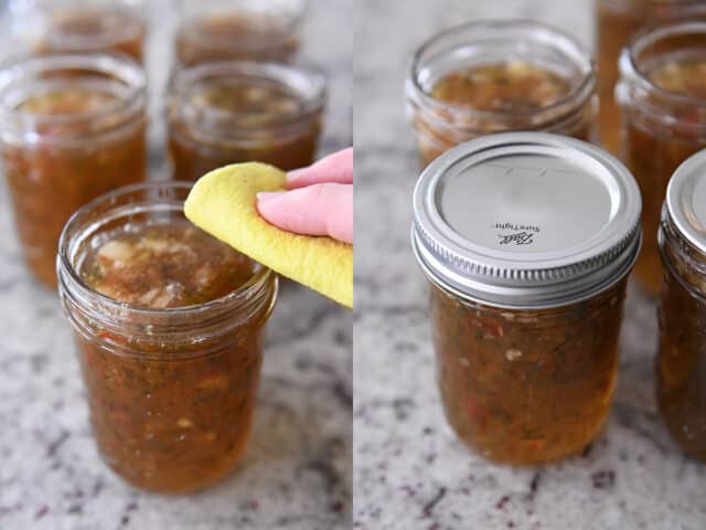 Wiping lid of canning jar; jar filled with jelly topped with lid and band.