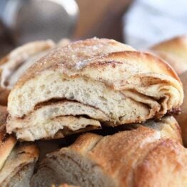 Piece of cinnamon sugar twisted croissant bread.