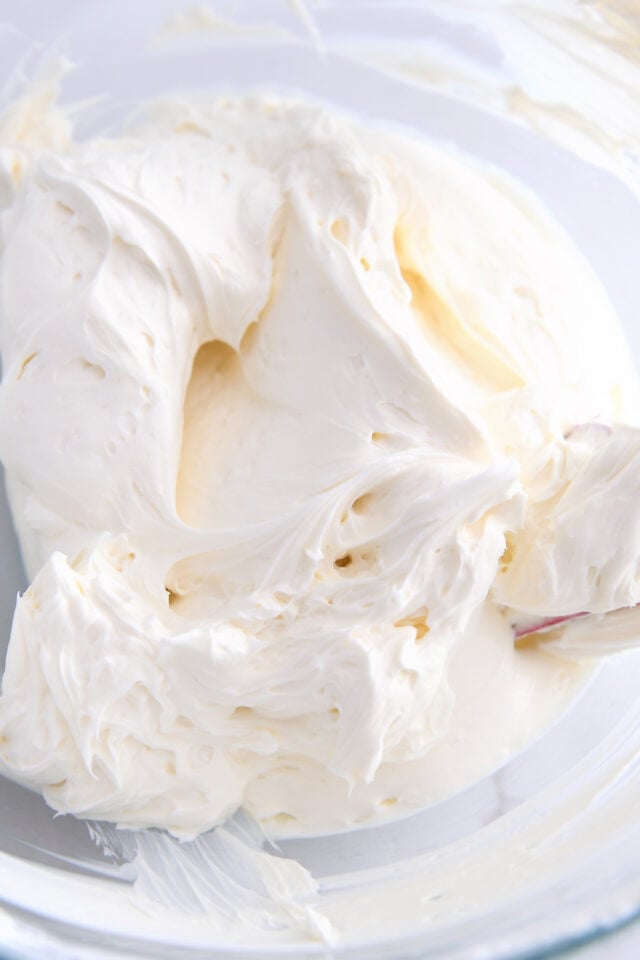 Glass bowl with whipped cream cheese.