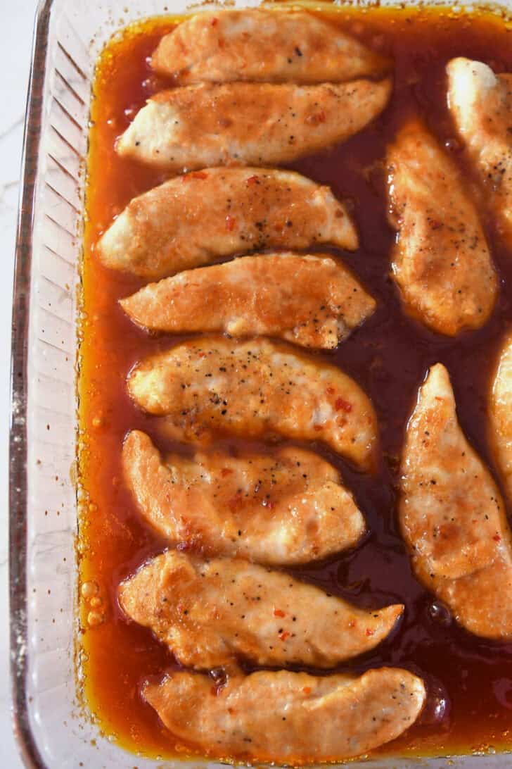 Baked chicken tenders in chili garlic sauce.