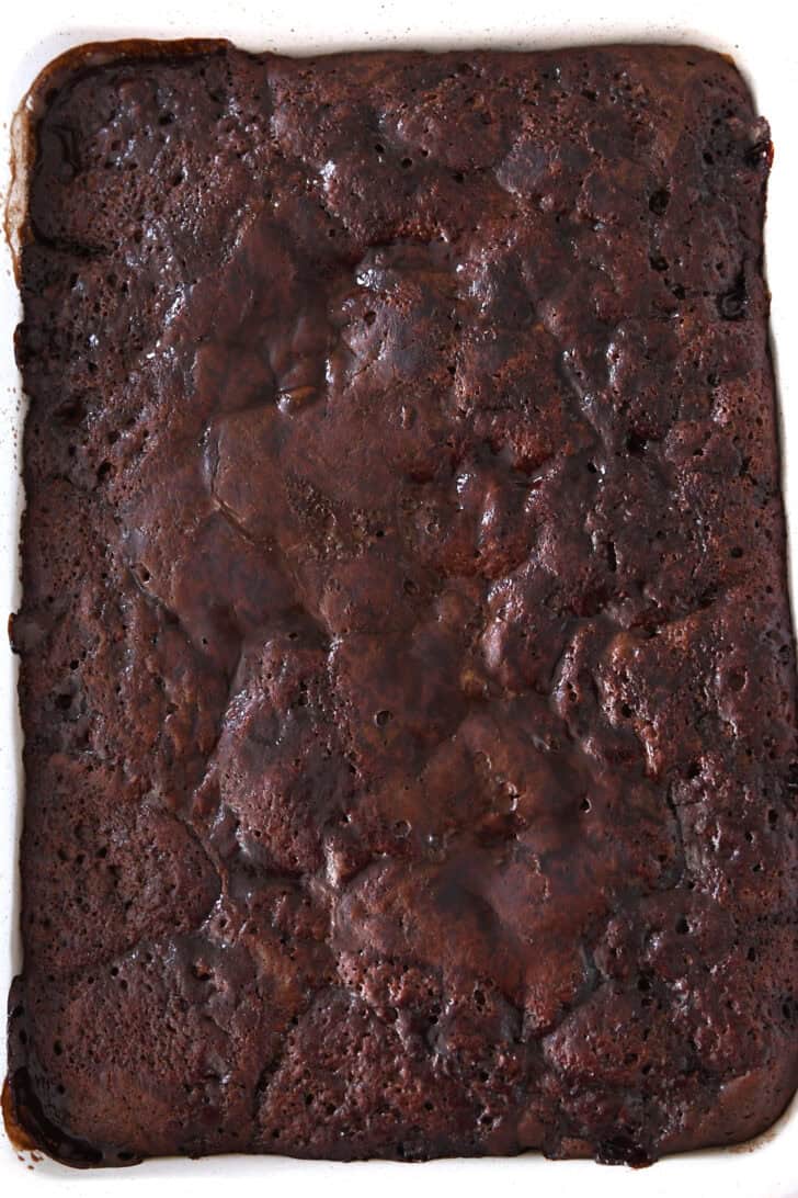 Baked hot fudge pudding cake in white 9X13-inch pan.