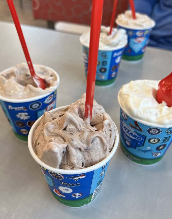 four mini dairy queen blizzards.