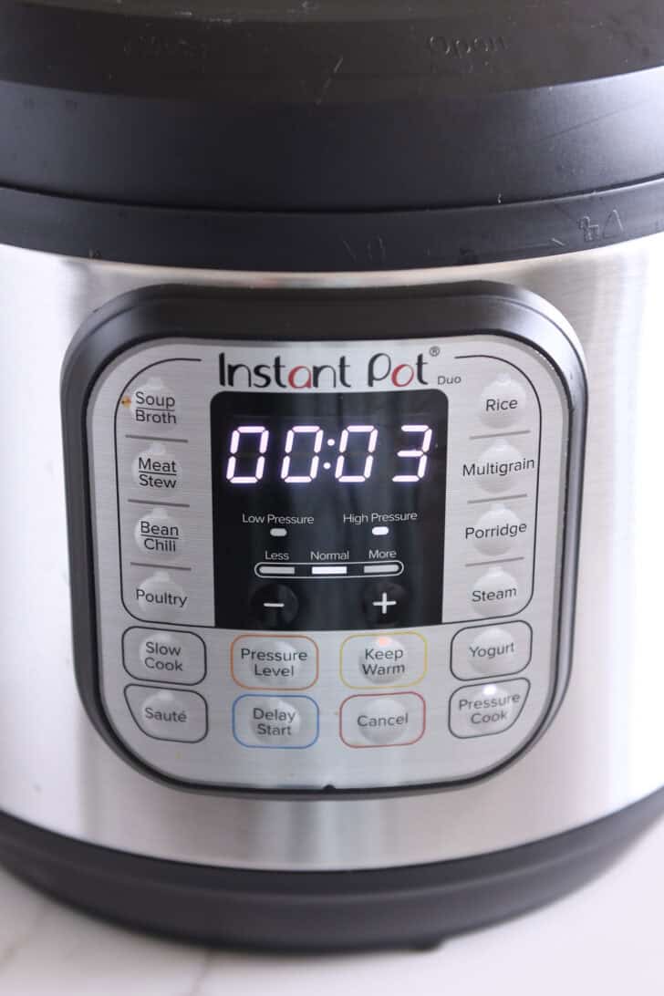 Instant Pot with three minutes set on timer.