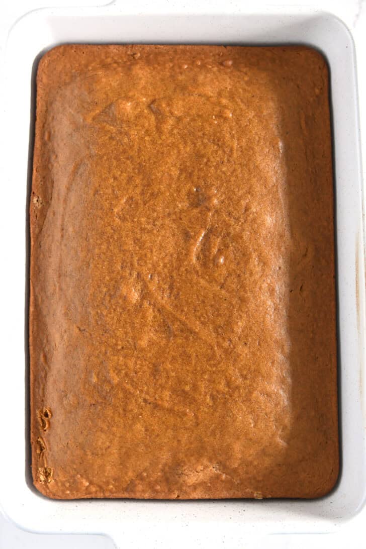 Top down view of pumpkin cake in white 9X13-inch pan.