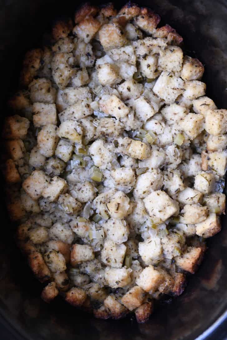Stuffing baked in an oval slow cooker.