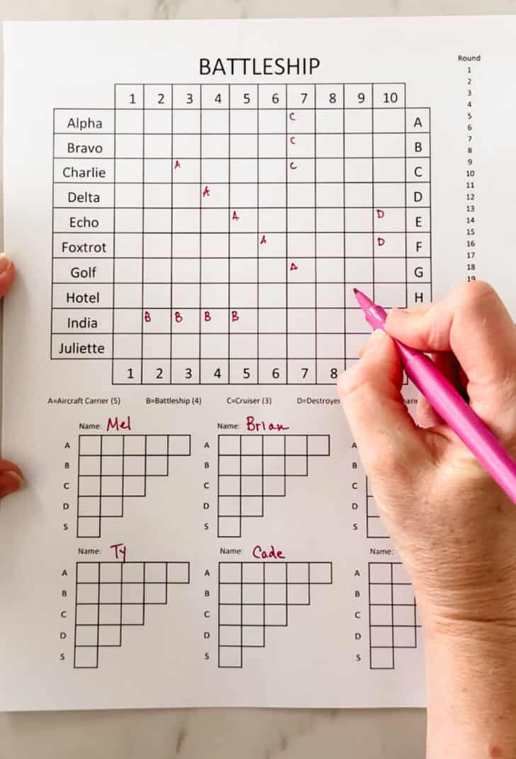 Paper battleship game filled out with names and ships.