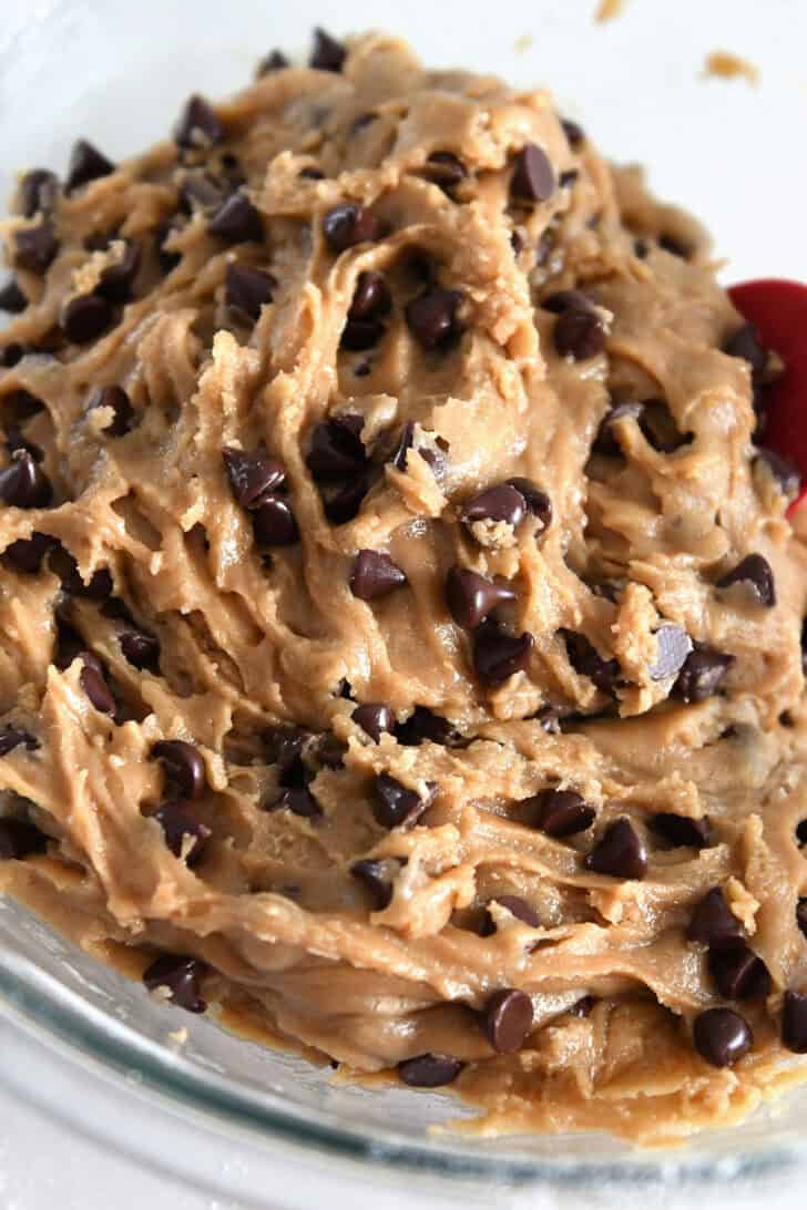 Bowl of unbaked chocolate chip cookie dough.