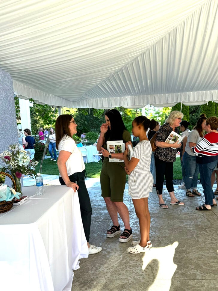 Mel greeting guests at cookbook launch.