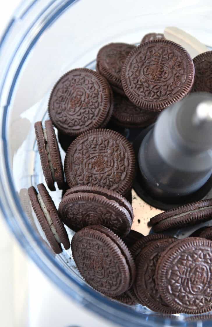 Top down view of Oreos in food processor.