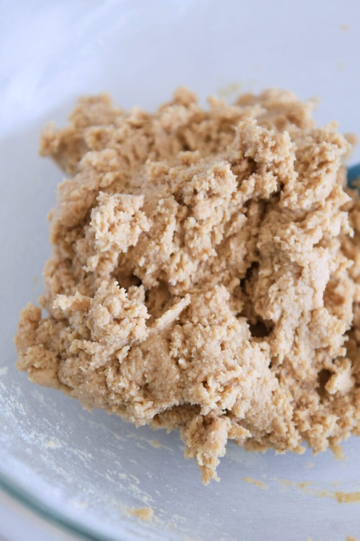 Glass bowl with graham cracker cookie dough.