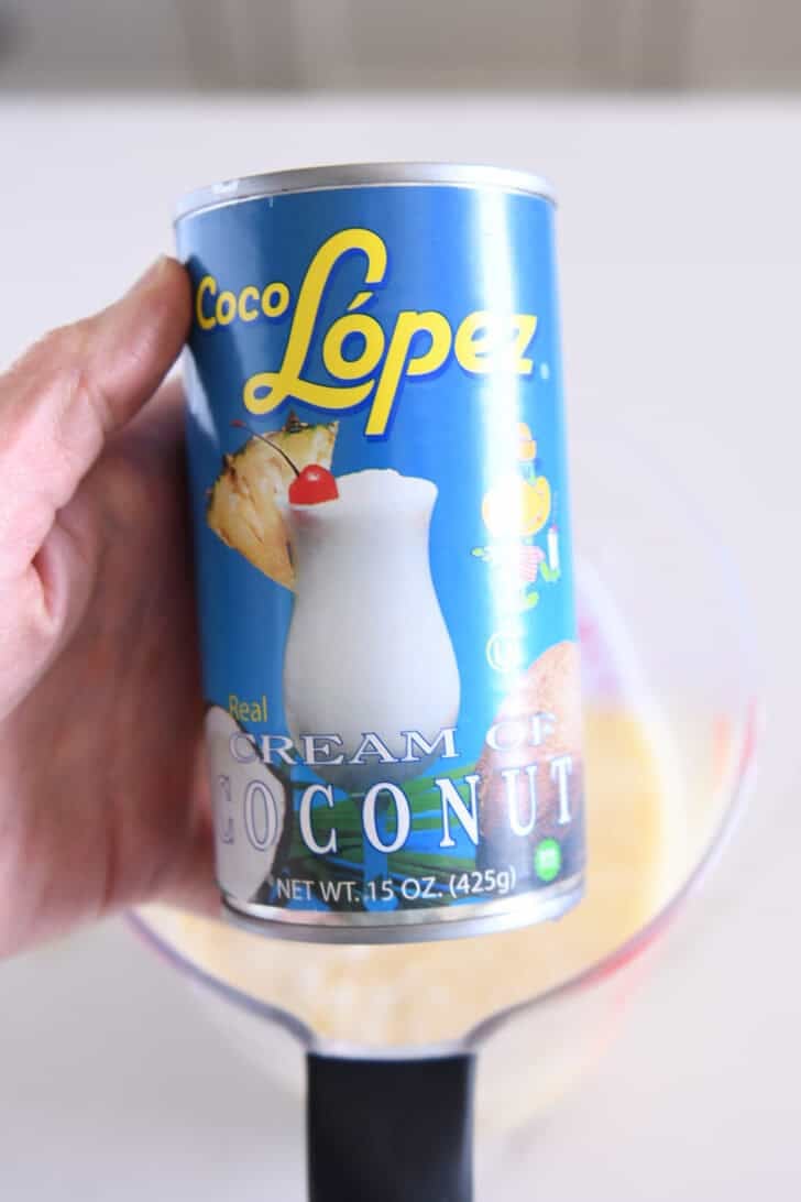 Can of blue coco Lopez cream of coconut.