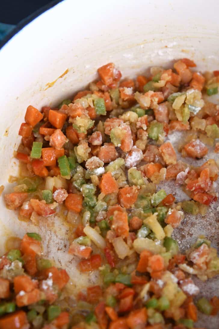 Sauteed carrots, celery, onions, and bell peppers stirred together with flour to thicken soup.