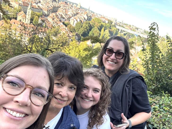 Four women standing at the top of Bern Rosengarten.
