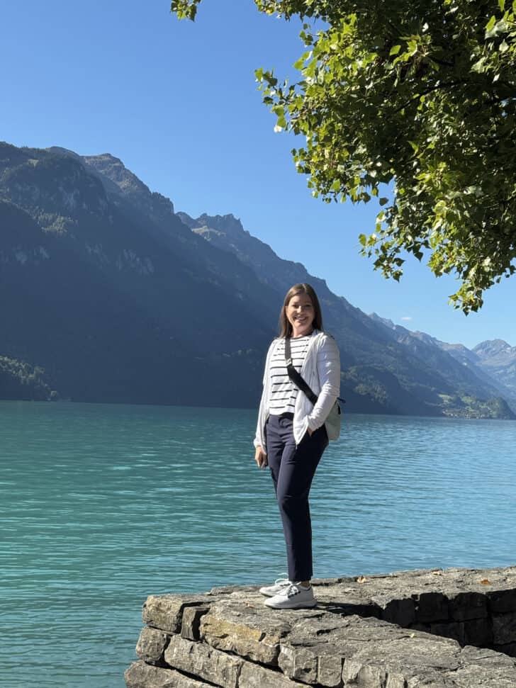 Mel standing on ledge by Lake Brienz.