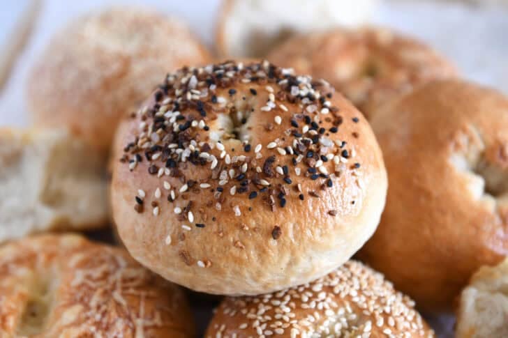 Everything bagel topped baked sourdough bagel.