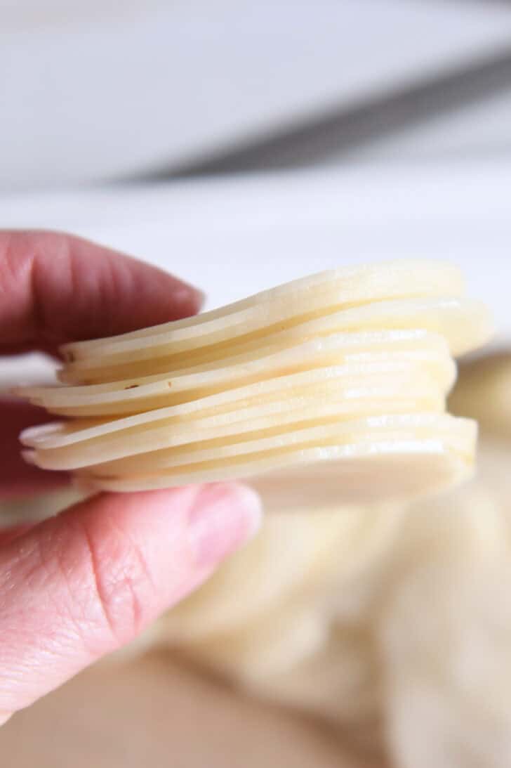 Thin slices of russet potatoes.