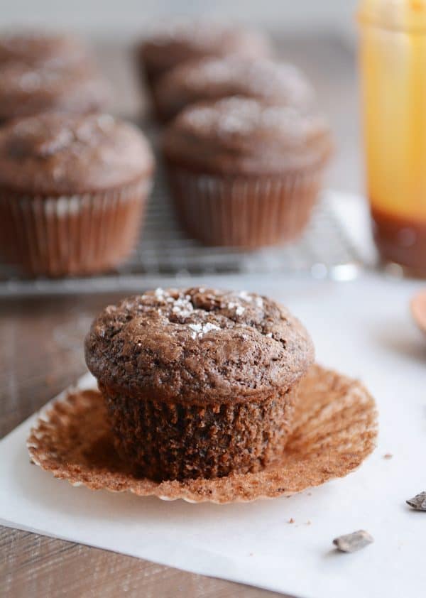Double chocolate salted caramel muffin with paper liner removed.