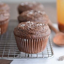 Double chocolate salted caramel muffin on cooling rack
