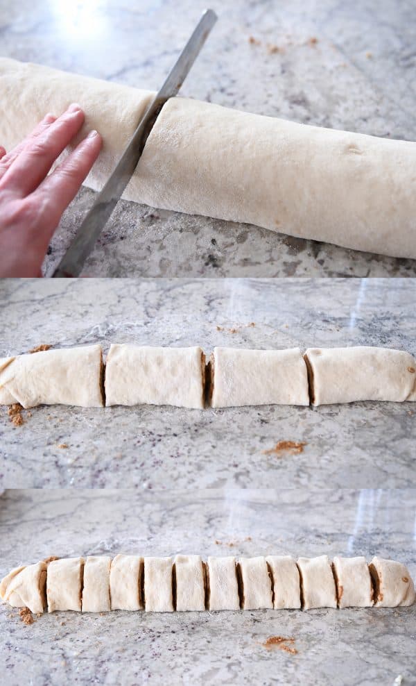 Cutting cinnamon roll log with serrated knife.