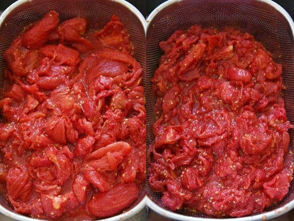 Draining tomatoes for homemade canned spaghetti sauce recipe.