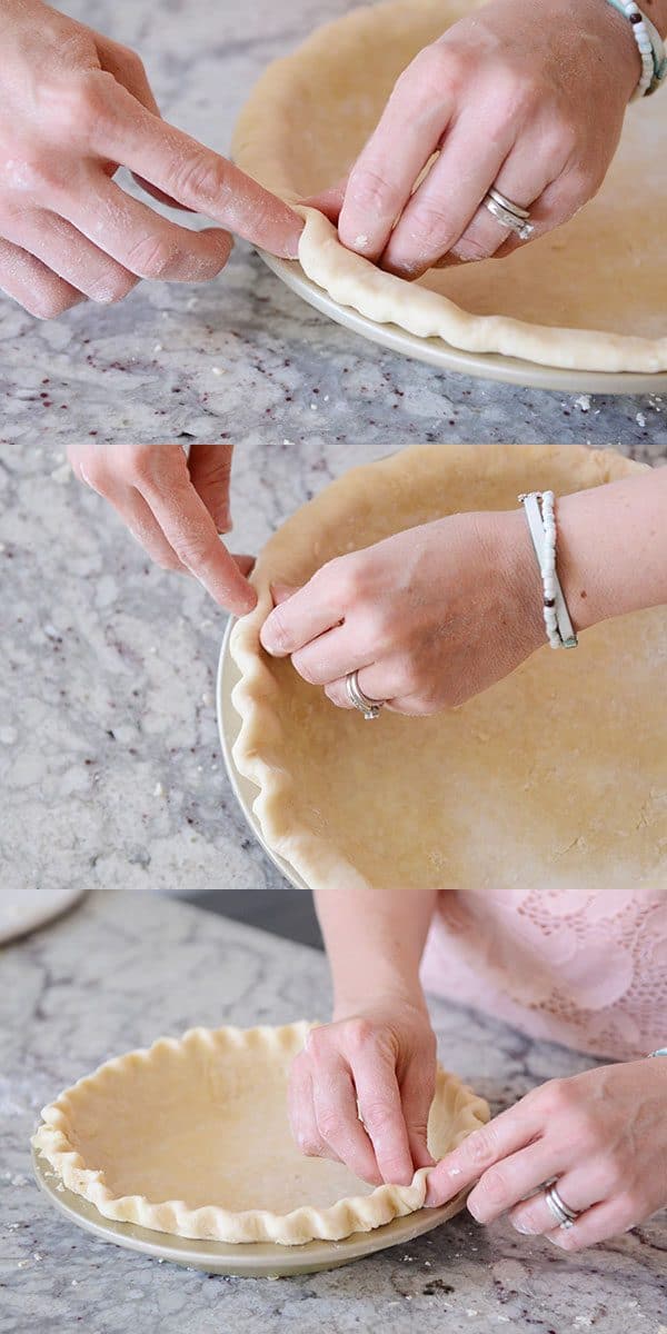 A pie crust getting crimped.