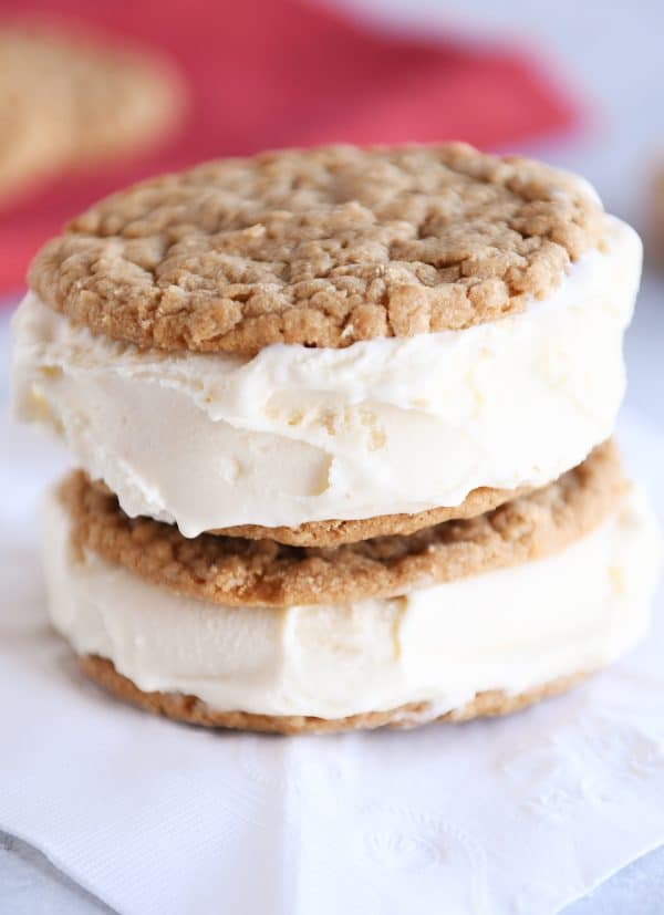 Gingerbread oatmeal cookies as ice cream sandwiches stacked.