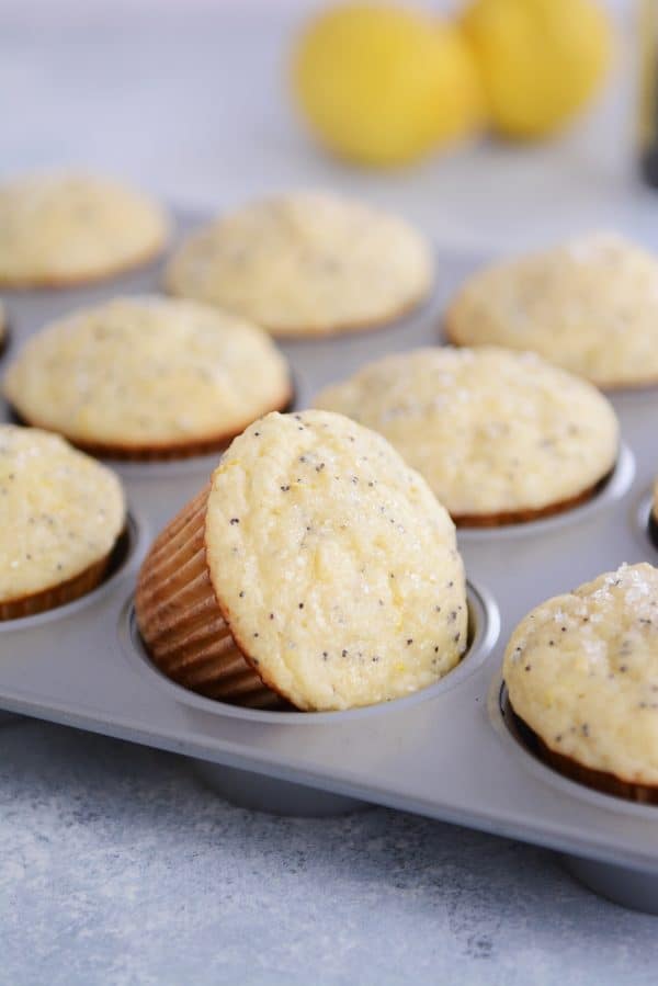 A muffin tin of lemon poppy seed muffins.