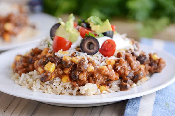 Mexican Haystacks: a smorgasbord of delicious taco flavors simmered together in a tasty sauce served over rice or quinoa. Easy, fast, yummy!