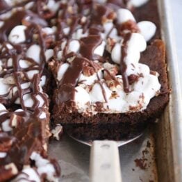 Spatula removing Mississippi Mud Bars from sheet pan.