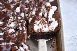 Spatula removing Mississippi Mud Bars from sheet pan.