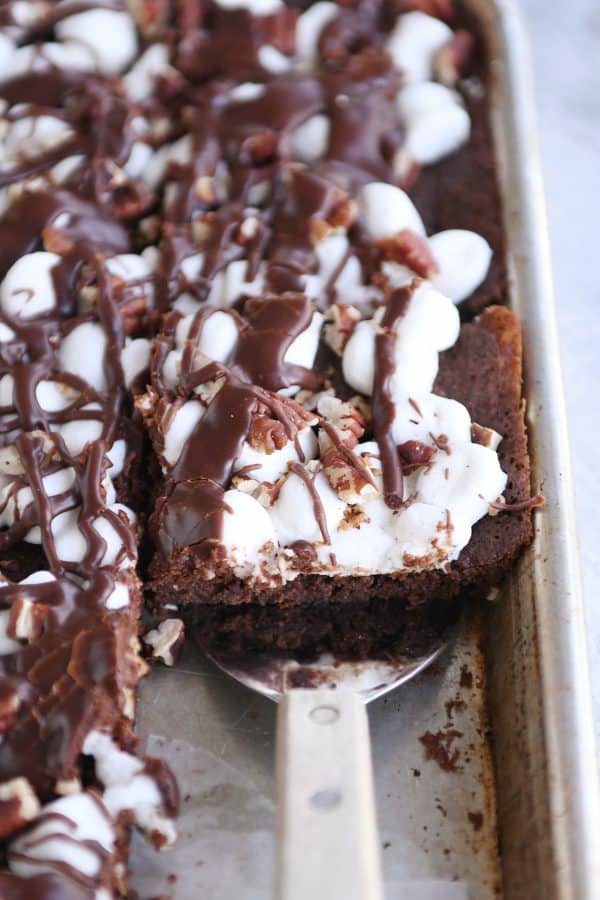Spatula removing Mississippi Mud Bars from sheet pan.
