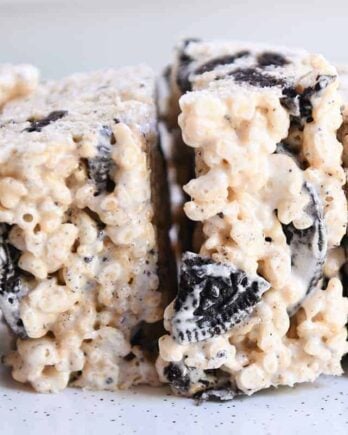 Oreo rice krispie treats side by side on white tray.
